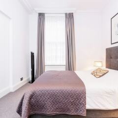 Апартаменты Harrods Luxury Apartments Лондон комната для гостей фото 5