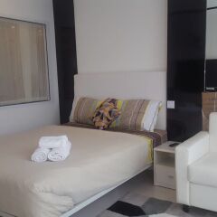 Отель City Center Residence by Pattaya Holiday Паттайя комната для гостей фото 5