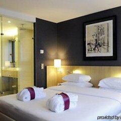 Отель Mercure Amsterdam City сейф в номере