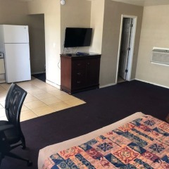 Отель American Executive Inn комната для гостей фото 2