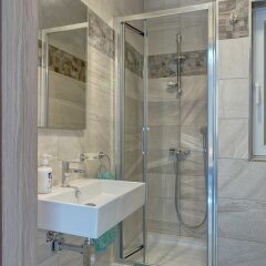 Апартаменты Luxury 2 Bedroom Apartment by the Sea Каура ванная фото 2