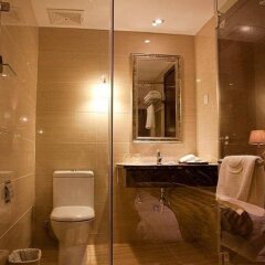 Отель Overseas Capital Hotel Китай, Джиангме - отзывы, цены и фото номеров - забронировать отель Overseas Capital Hotel онлайн ванная