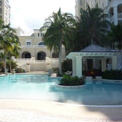 Отель Palmyra Luxury Beach Condo