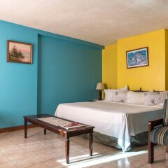 Апартаменты Deluxe Turtle Towers Apartments комната для гостей фото 4