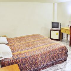 Отель Highfive Guest House удобства в номере