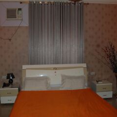 Отель Golden Valley Hotel Enugu Нигерия, Нсукка - отзывы, цены и фото номеров - забронировать отель Golden Valley Hotel Enugu онлайн удобства в номере