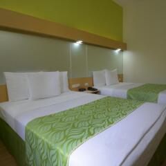 Отель Microtel Inn And Suites Davao Филиппины, Давао - отзывы, цены и фото номеров - забронировать отель Microtel Inn And Suites Davao онлайн комната для гостей фото 3