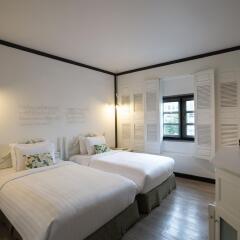 Отель The Raweekanlaya Bangkok Wellness Cuisine Resort Бангкок комната для гостей