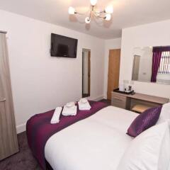 Queens Promenade Hotel комната для гостей