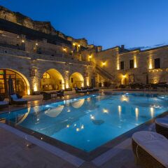 Отель Kayakapi Premium Caves Cappadocia бассейн фото 3