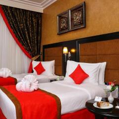 Отель Royal Grand Suite Шарджа комната для гостей