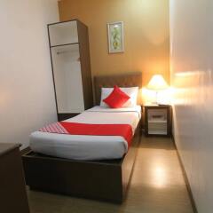 Отель OYO 106 24H City Hotel Филиппины, Макати - отзывы, цены и фото номеров - забронировать отель OYO 106 24H City Hotel онлайн комната для гостей