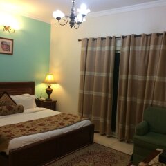 Ramee Suite 4 Apartment Bahrain in Manama, Bahrain from 75$, photos, reviews - zenhotels.com guestroom