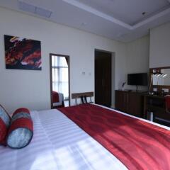 Отель Ramada Encore Kuwait Downtown сейф в номере