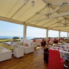 Отель Intercontinental Aphrodite Hills Кипр, Киссонерга - отзывы, цены и фото номеров - забронировать отель Intercontinental Aphrodite Hills онлайн гостиничный бар