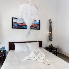 Отель Cashew Tree Bungalow сейф в номере