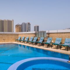 Отель Tulip in al Khan ОАЭ, Шарджа - отзывы, цены и фото номеров - забронировать отель Tulip in al Khan онлайн бассейн фото 2