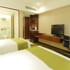 Отель Holiday Inn Qingdao City Centre, an IHG Hotel Китай, Циндао - отзывы, цены и фото номеров - забронировать отель Holiday Inn Qingdao City Centre, an IHG Hotel онлайн удобства в номере