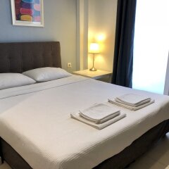 Апартаменты Sokratous Private Apartments комната для гостей фото 4