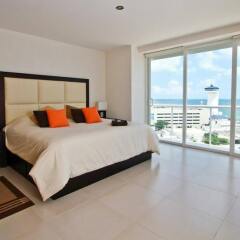 Отель Amara Cancun Beachfront Condos Мексика, Канкун - отзывы, цены и фото номеров - забронировать отель Amara Cancun Beachfront Condos онлайн комната для гостей фото 4