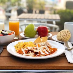Отель Holiday Inn Express Guadalajara Iteso питание фото 2