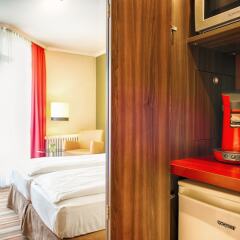 Отель Leonardo Hotel & Residenz München Германия, Мюнхен - 11 отзывов об отеле, цены и фото номеров - забронировать отель Leonardo Hotel & Residenz München онлайн удобства в номере фото 2