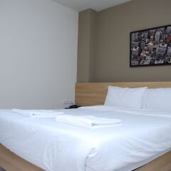 Отель Portico Residence Бангкок комната для гостей
