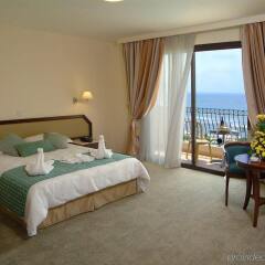 Aquamare Beach Hotel & Spa комната для гостей фото 5