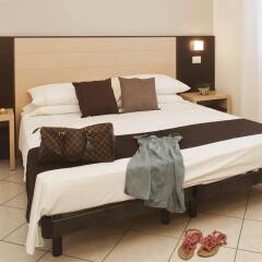Hotel Ostuni Римини комната для гостей