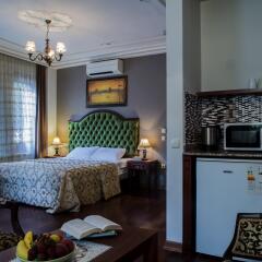 Апартаменты Tashkonak Sultan Suites and Apartments удобства в номере фото 2