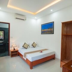 Отель Tra Que Flower Homestay Вьетнам, Хойан - отзывы, цены и фото номеров - забронировать отель Tra Que Flower Homestay онлайн комната для гостей фото 5