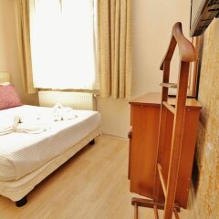 Апартаменты Camelot Apartment комната для гостей фото 4