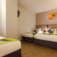 Отель Comfort Suites Rive Gauche Lyon Centre Франция, Лион - отзывы, цены и фото номеров - забронировать отель Comfort Suites Rive Gauche Lyon Centre онлайн комната для гостей