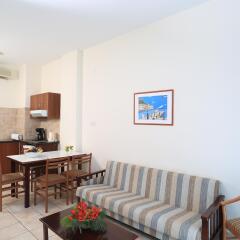 Jacaranda Hotel Apartments в номере