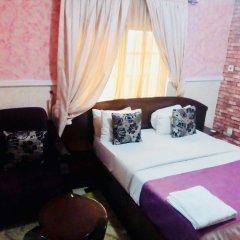 Отель Limoh Suites Нигерия, г. Бенин - отзывы, цены и фото номеров - забронировать отель Limoh Suites онлайн комната для гостей фото 5
