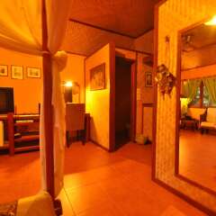 Отель The Old Tree House удобства в номере