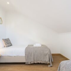 Отель Rato Cozy 3BR w/balcony - by LU Holidays Португалия, Лиссабон - отзывы, цены и фото номеров - забронировать отель Rato Cozy 3BR w/balcony - by LU Holidays онлайн комната для гостей фото 5
