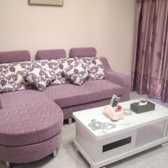 Апартаменты Shenzhen Xin Phoenix Gang Ao 8 Apartment комната для гостей фото 4