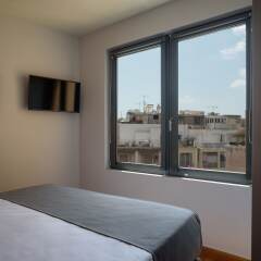 Отель Fos DownTown Suites Афины комната для гостей фото 15
