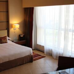 Отель Khalidiya Palace Rayhaan by Rotana комната для гостей фото 8