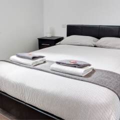 Апартаменты Linton Apartments комната для гостей