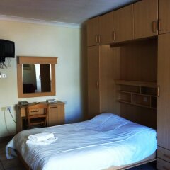 Отель Clover Holiday Complex Каура сейф в номере