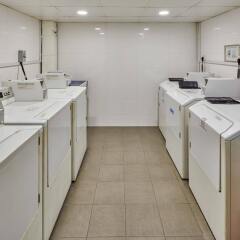 Апартаменты Orange Grove Service Apartment by ST Residences в номере