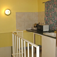 Отель Executive Shaw Park Guest House в номере