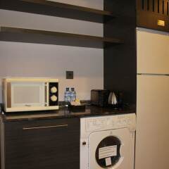 Signature Hotel Apartments & Spa удобства в номере