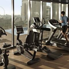 Отель Pan Pacific Serviced Suites Beach Road, Singapore фитнесс-зал фото 2