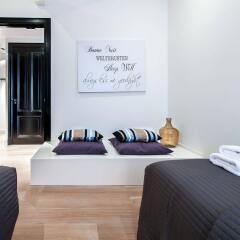 Апартаменты Tropen Apartments комната для гостей фото 2