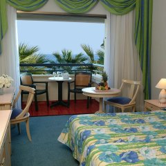 Отель Palm Beach Hotel & Bungalows Кипр, Ларнака - 1 отзыв об отеле, цены и фото номеров - забронировать отель Palm Beach Hotel & Bungalows онлайн комната для гостей фото 2