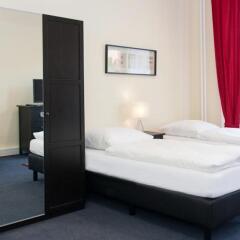 Отель Berliner City Pension Uhlandstrasse Берлин комната для гостей фото 5