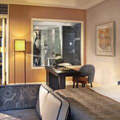 Отель Ascott Raffles Place Singapore комната для гостей фото 2